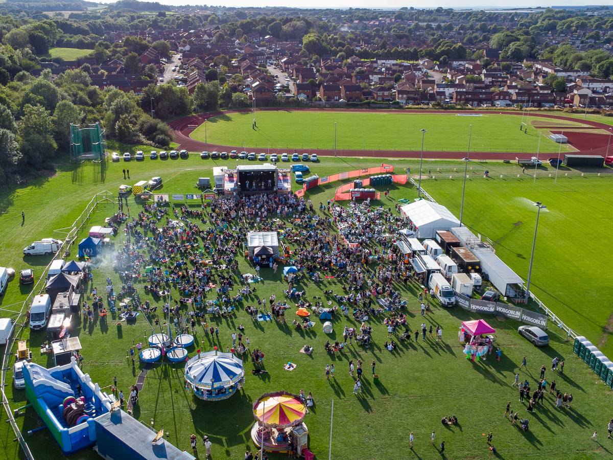 Aerial view of a busy outdoor community event